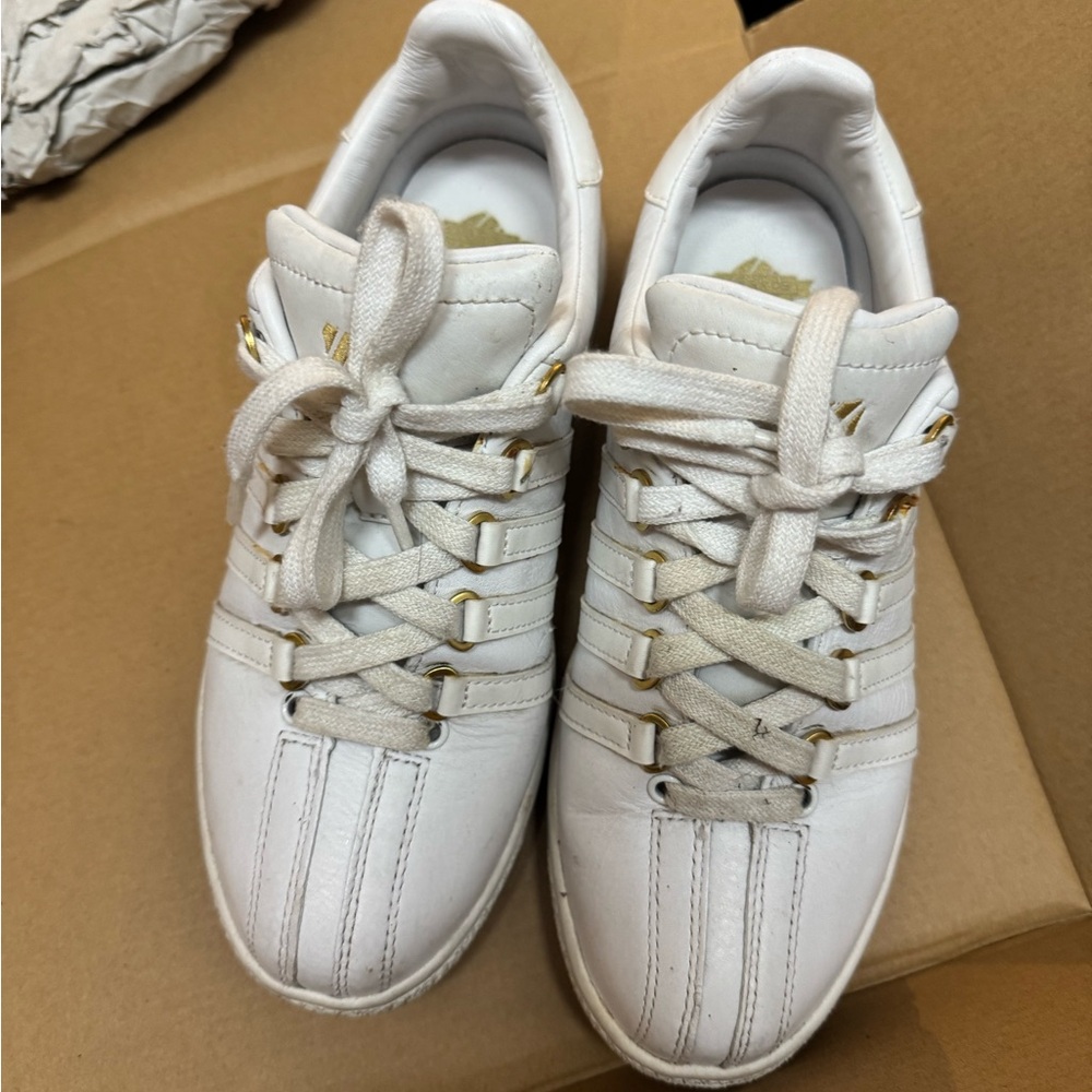 White Sneakers with Gold Accents
